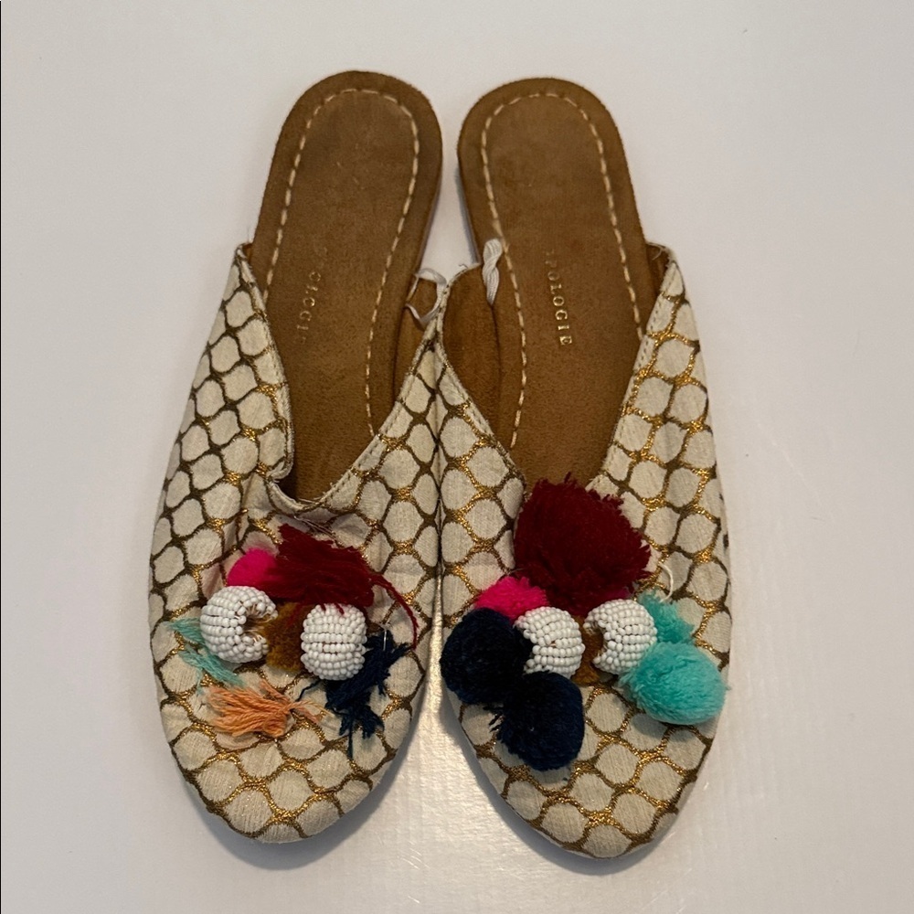 Anthropologie Gold and Cream Pom-Pom Mules